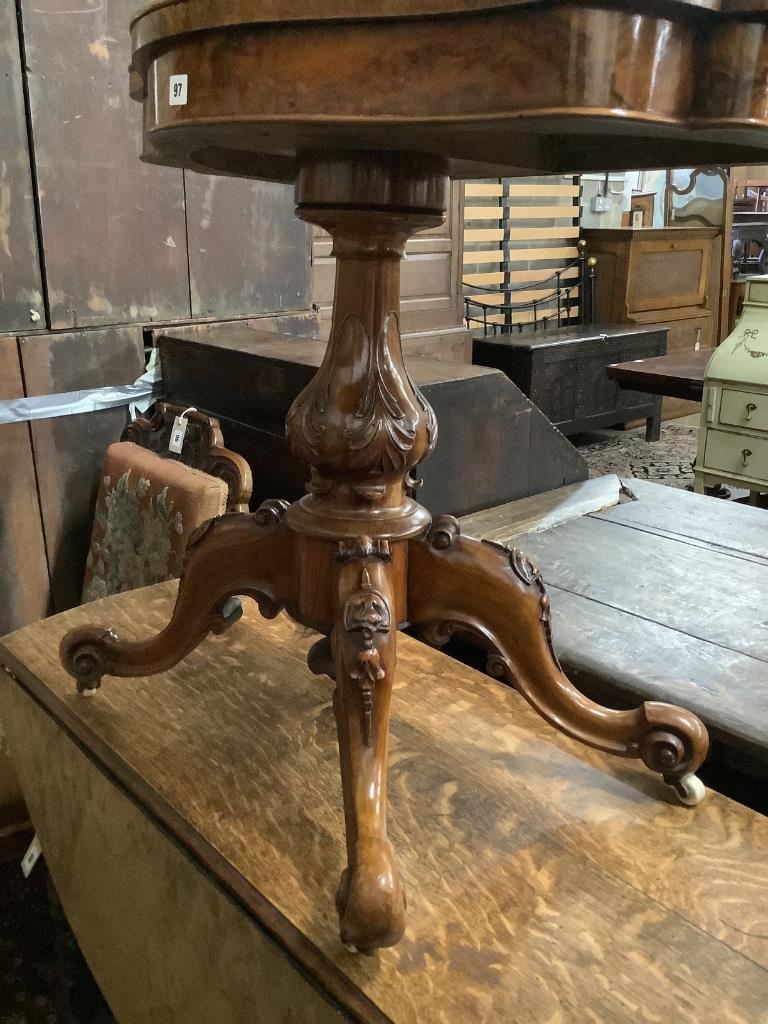 A Victorian figured walnut serpentine folding card table, width 90cm, depth 45cm, height 76cm